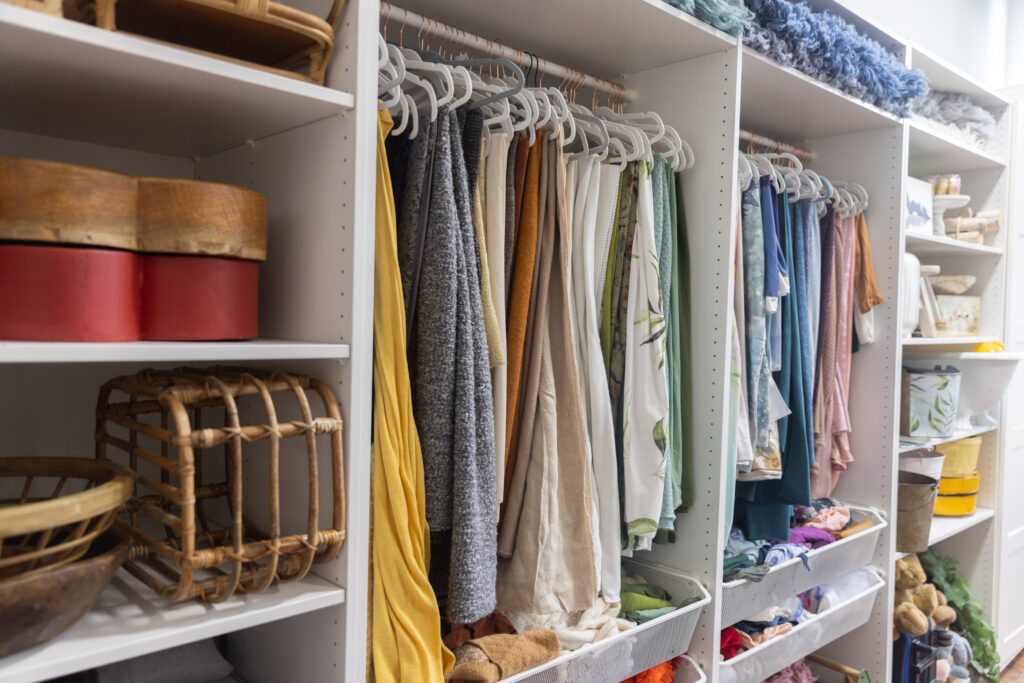 Photography studio client closet with props, wraps, backdrops, and styling options available at Alternate Angles Photography in Norwood MA